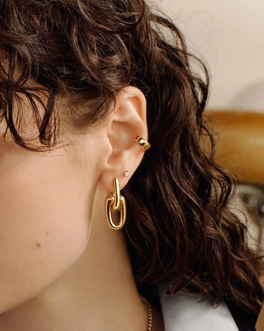 Sculptural Interlocking Huggie Hoop Earrings