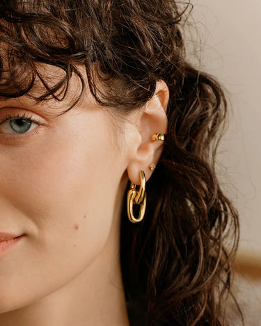 Sculptural Interlocking Huggie Hoop Earrings
